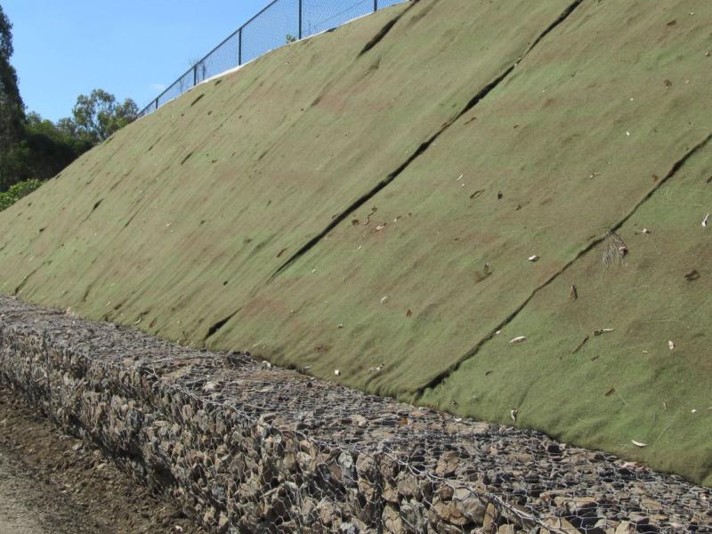 Geosynthetics stabilise eroding rail embankment
